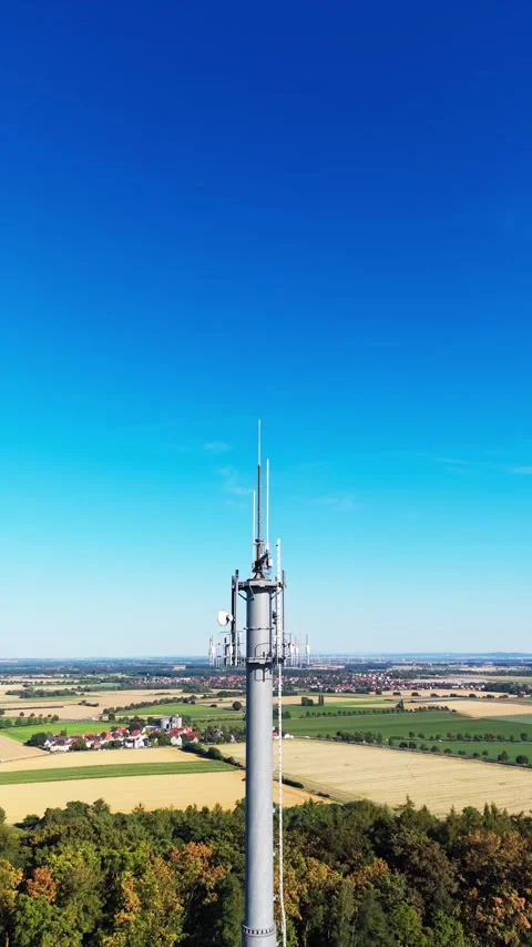 5G mast orbiting aerial vertical view rural landscape Stock Footage 341864457