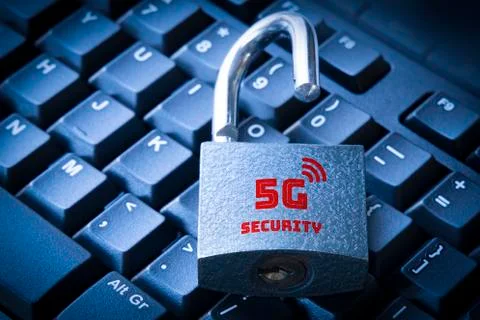5G mobile network security concept open padlock on the computer keyboard. Stock Photos