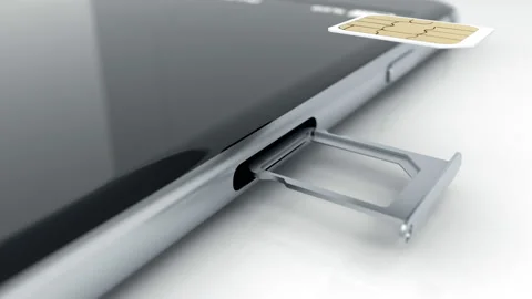5g sim card installing in the slot of smartphone Видео 132294451