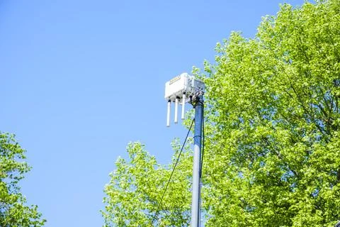 5G small cell antenna on pole with copy space Stock Photos