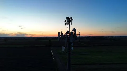 5G telecommunication tower bringing advanced cellular network connectivity .. Stock Photos