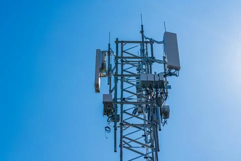 A 5g tower with complex array of equipment Stock Photos