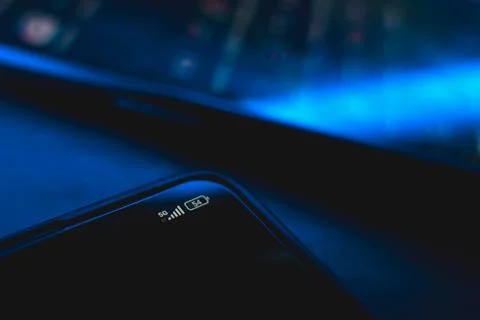 5G wireless internet indicator on cellphone screen Stock Photos