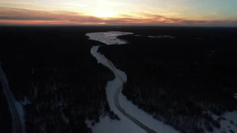 5K Aerial Drone View To The Snow Covered Coniferous Forest Trees At Sunset. Stock Footage 229753546
