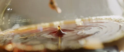 5K Cinemascope - Pour over filter coffee dripping and spinning in glas carafe Stock Footage 128519683