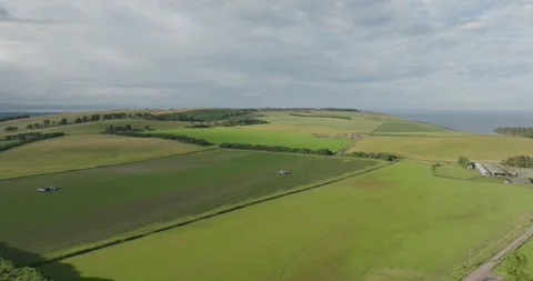 5K Drone Flying Over Scottish Farmland with Sea in the Distance Stock-Footage 285533715