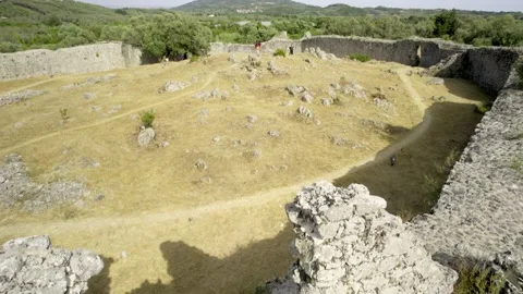 5k HDR Corfu Greece viewing Dancing Woman from Edge of Fortress Wall 10Bit Stock Footage 200957871