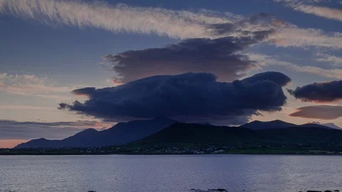 5k time lapse of clouds over Brandon mountains by the ocean, Dingle, Ireland Stock Footage