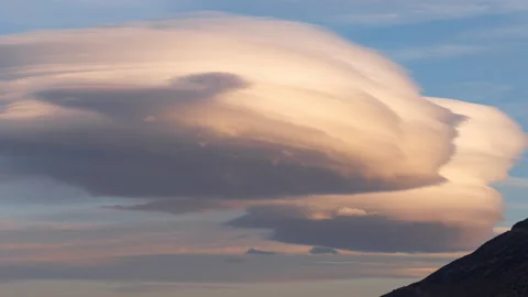 5K Time lapse of epic lenticular clouds at sunset in Eastern Sierra, California Stock Footage 153329406