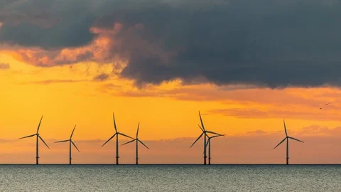 5k time lapse of offshore wind turbines at Colwyn Bay on the North Wales coast Stock Footage 106996098
