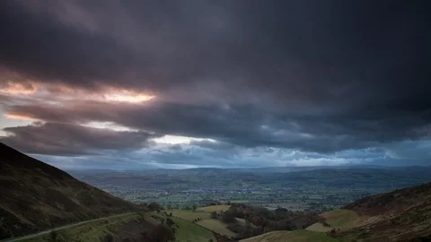5k time lapse storm clouds over Ruithin at sunset, North Wales Stock Footage 109476150