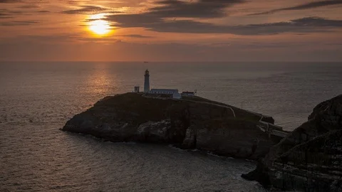 5k time lapse sunset over South Stack lighthouse, Anglesey, Wales Stock Footage 109797480