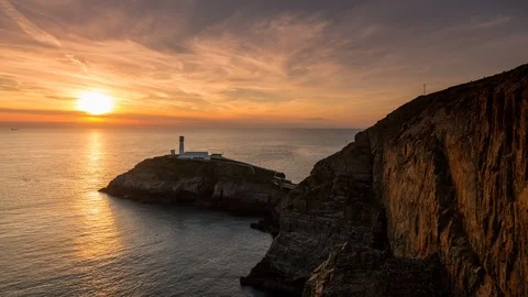5k time lapse sunset over South Stack lighthouse, Anglesey, North Wales Stock Footage 110317968