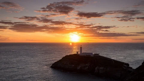 5k time lapse of sunset over South Stack lighthouse, Anglesey coast, North Wales Stock Footage 110372738