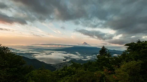 5K Timelapse Wide Shot of Mt. Fuji over Sea of Clouds at Sunrise in Japan Stock Footage