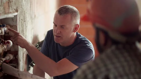 5of11 Men at work in construction site, manual workers Video stock 26393084