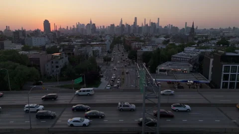 6-6-25, Brooklyn, NY, USA -  sunset fly over McGuinness Blvd, Greenpoint to NYC Video stock 310711314