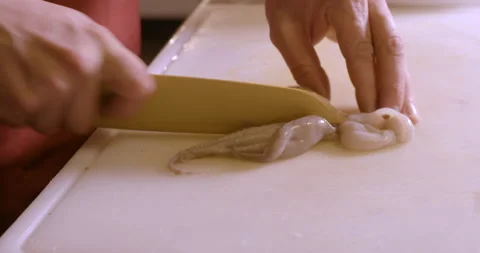 6 Man As Professional Chef Cutting Octopus In Restaurant Kitchen Stock Footage 132258841