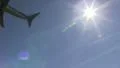 6. Sun, plane approach HD Footage