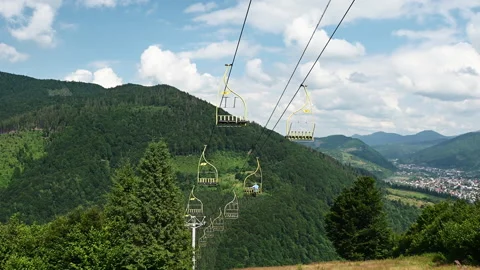 60 fps 4K video of ropeway in mountains with beautiful view at summer day Stock Footage 164020654