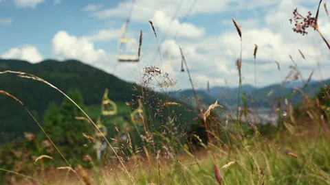 60 fps 4K video of ropeway in mountains with beautiful view at summer day Video stock 164022724