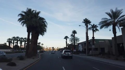 60 fps driving shot during sunny evening in Palm Desert, California 스톡 동영상 107940942