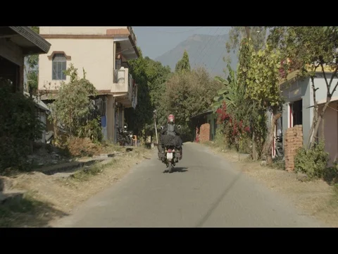 60 fps Slow Motion of Motorcycle Road Trip Passing Through Villages In India Stock Footage 73006243