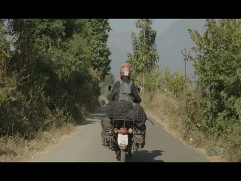 60 fps Slow Motion of Motorcycle Road Trip Passing Through Villages In India Stock Footage 73006260