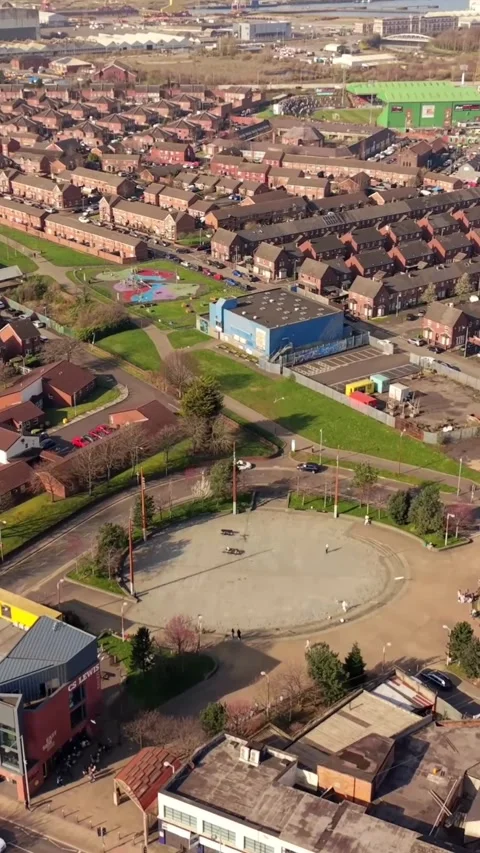 60FPS vertical social ratio passover aerial GV of C.S. Lewis Square in East Stock Footage 333153685