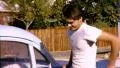 60s HAPPY Joy DANCE Jig Dancing Young MAN Washes Old Car Vintage Film Home Movie HD Footage