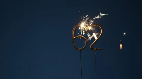 62 Years Celebration Festive Background with Sparklers Stock Footage 323226924