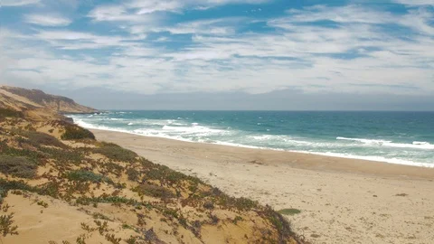 64 View of the beach with birds flying by Stock-Footage 93472946