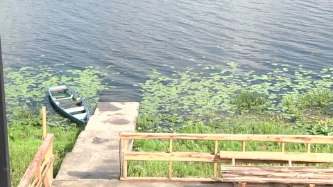 64.  View of the river from the gate of the private house. Video stock 92937381