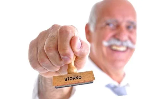 65, 70, Jahre, Mann hält Stempel in der Hand, Aufschrift: Storno, McPBLE *.. Stock Photos