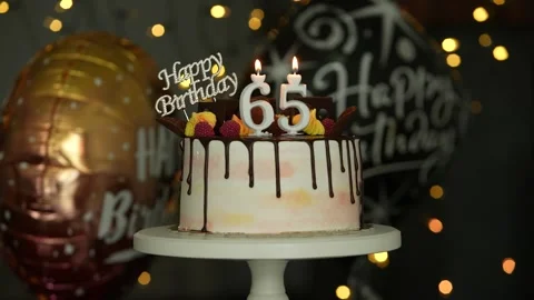 65th Birthday Cake with decorations Stock Footage 249953237
