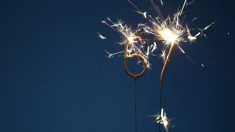 67 Years Celebration Festive Background with Sparklers Stock Footage 323226932