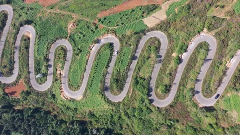 68-turns zig-zag road in Yiliang, Yunnan province Stock Footage 151993959