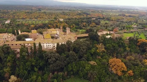 680 Aerial shot, a small ancient town situated in the middle of rural landsca Stock Footage 80914176