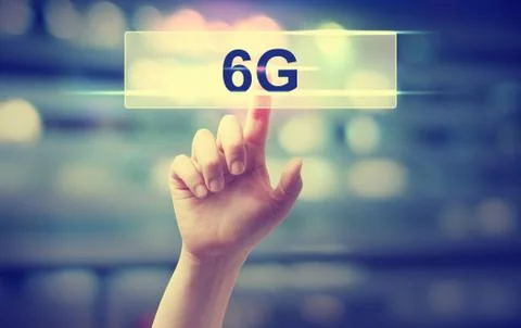 6G concept with hand pressing a button Stock Photos