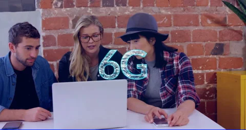 6G technology animation over diverse people working on laptops and smartphones Stock Footage 304575155