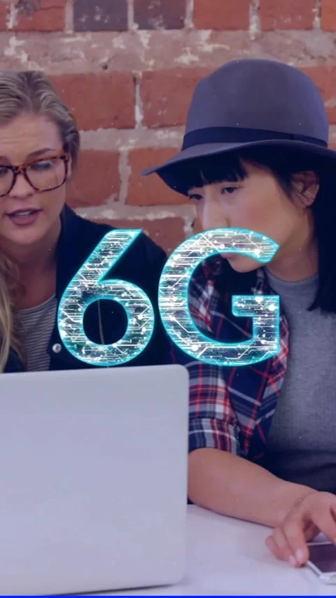 6G technology animation over diverse people working on laptops and smartphones Stock Footage 341956899