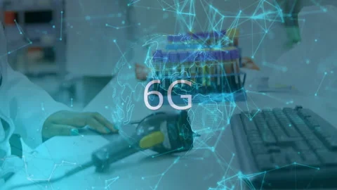 6G technology text animation over person working with computer and scanner Stock Footage 304955482