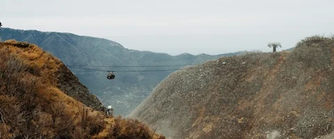 6K - Cable Car Moving Over a Mountain Gap Stock Footage 125708323