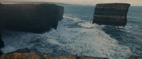 6K - Looking Up Sunrise at Downpatrick Head in Ireland Stock Footage 123389036