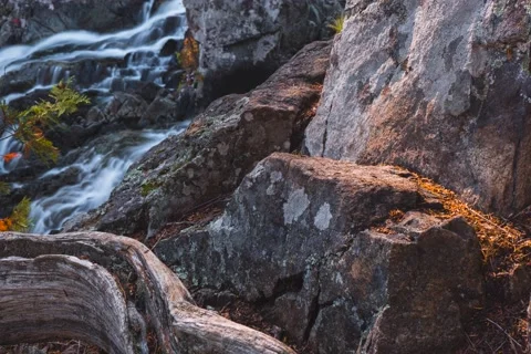 6k Motion Timelapse - Waterfall and Log/Rocks at Sunset Stock Footage 165693755
