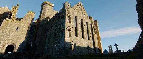 6K - Shaded Castle During Sunset in Ireland Stock Footage 123372425