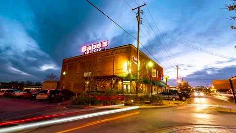 6K Timelapse of a Busy Restaurant at Sunset, Clouds Rolling Overhead, Vibrant Video stock 146617613