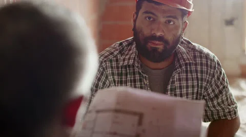 6of11 Men at work in construction site, manual workers Stock Footage 26393462