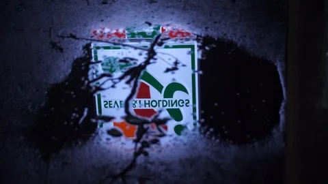 7-11 Sign Reflection in Puddle (2) Stock Footage 95034102