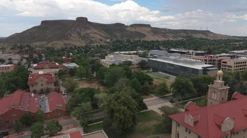 7-30-26, Golden, CO, USA - flying counter clock around quad CO School of Mines Stock Footage 341034732